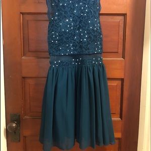 Two semi formal dresses.